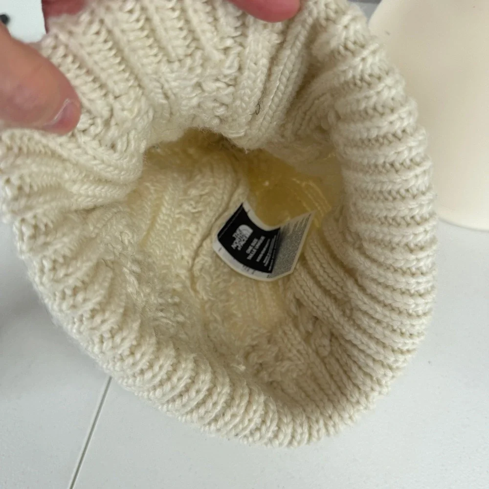 The North Face Kids OS Beanie Cable Knit Faux Fur Pom Pom Cream Hat NF0A7WFL